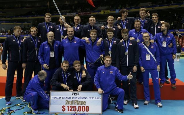 Players and staff of team Russia pose after placing second during фото (photo)