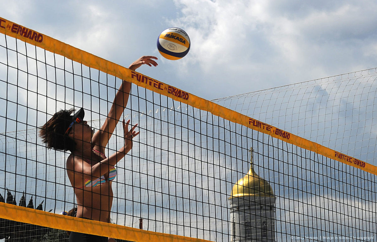 A beach volleyball player takes part in