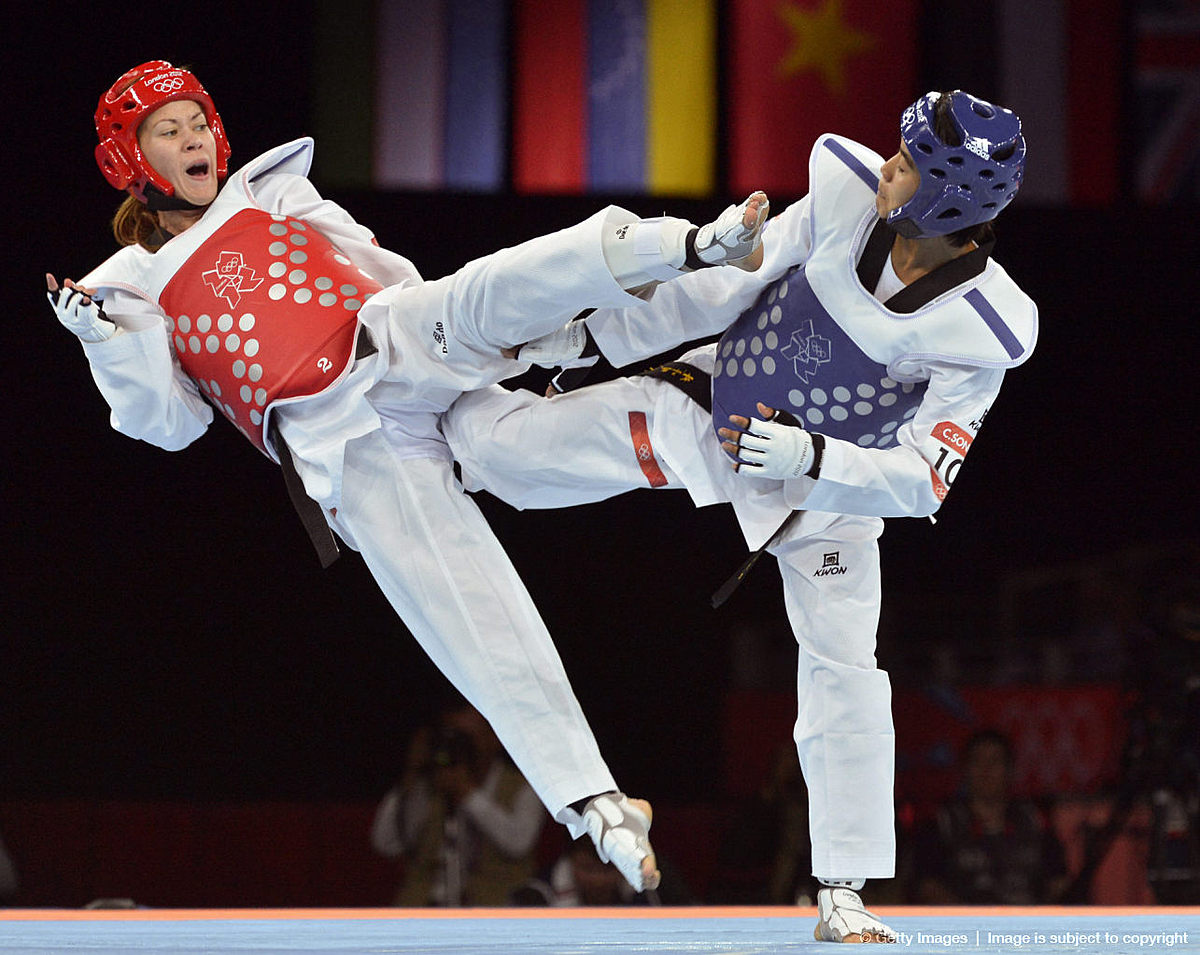 Тхэквондо (таэквондо, taekwondo): Thailand's Chanatip Sonkham (R) fights a