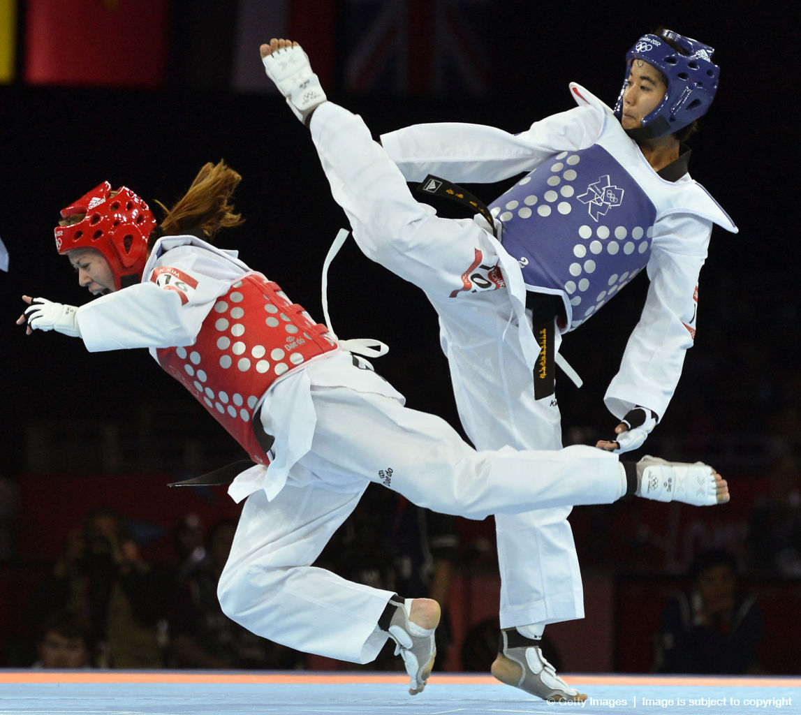 Тхэквондо (таэквондо, taekwondo): Thailand's Chanatip Sonkham (R) fights a