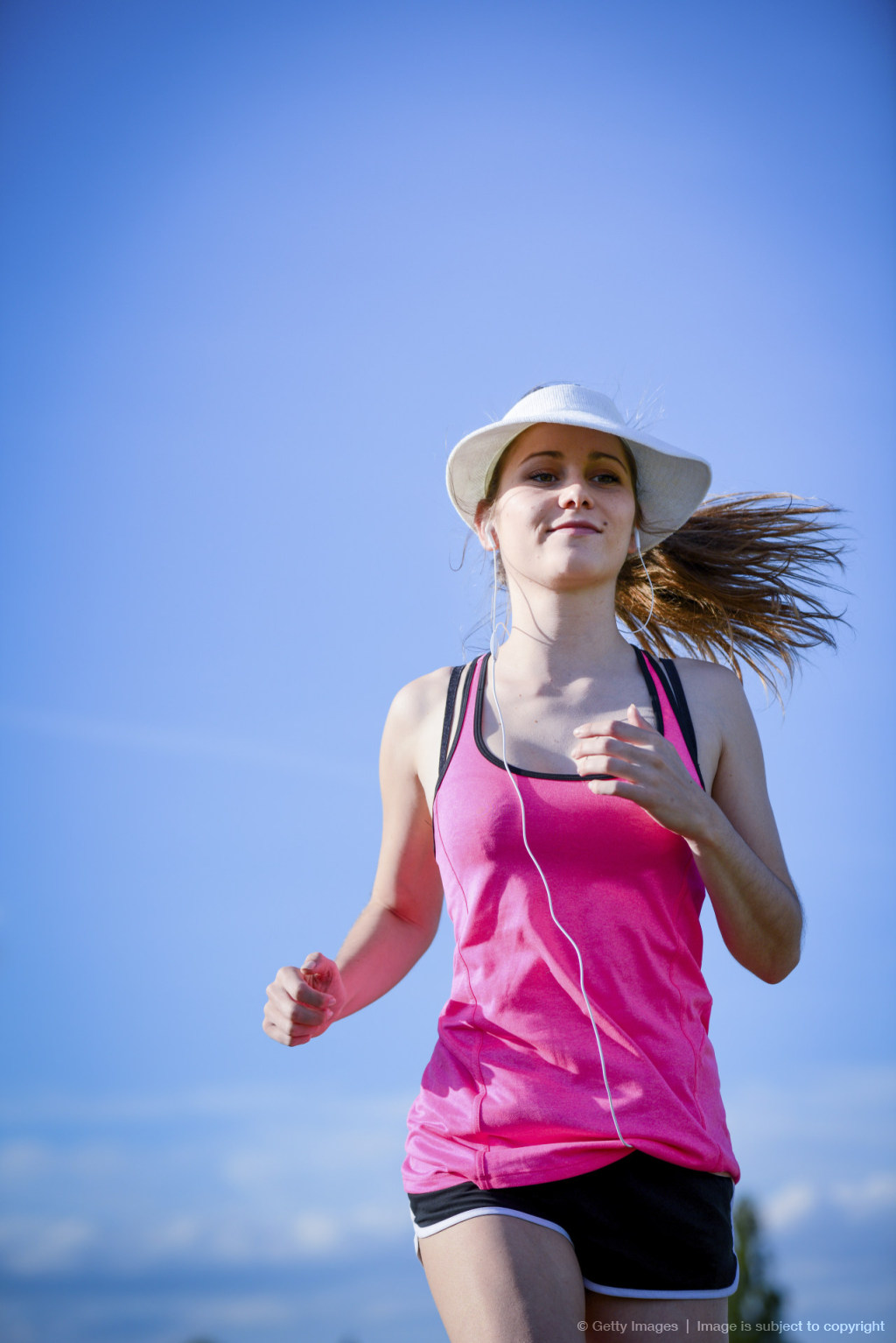 fitness sport healthy and cheerful young woman running outdoor