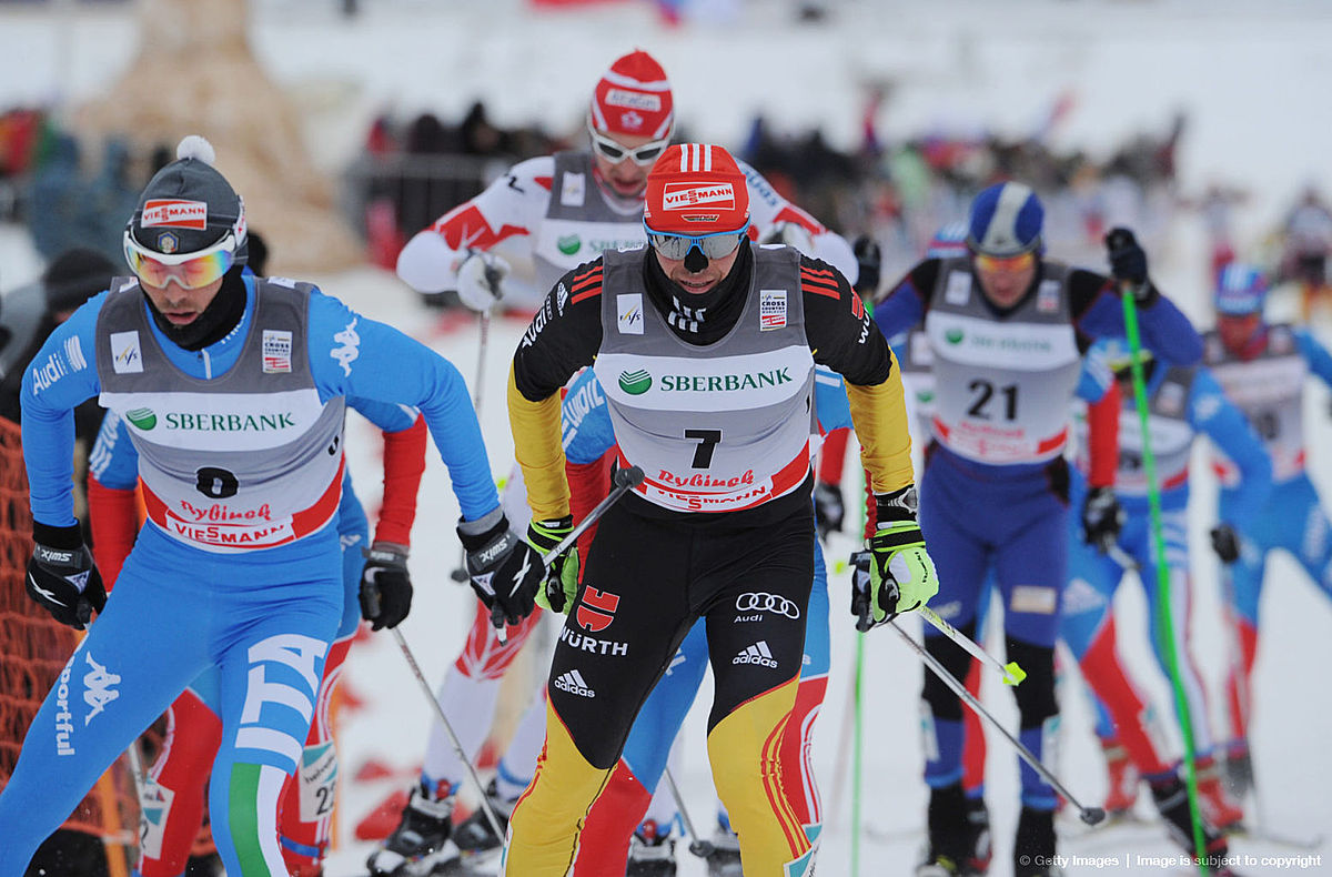 Tobias Angerer of Germany (C) skis for t