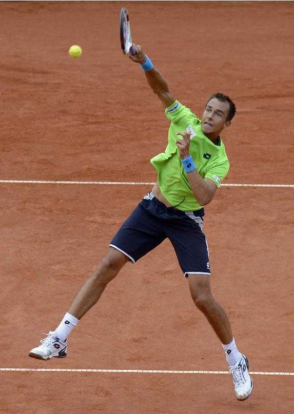 Czech Republic's Lukas Rosol smashes a ball to Russia& фото (photo)
