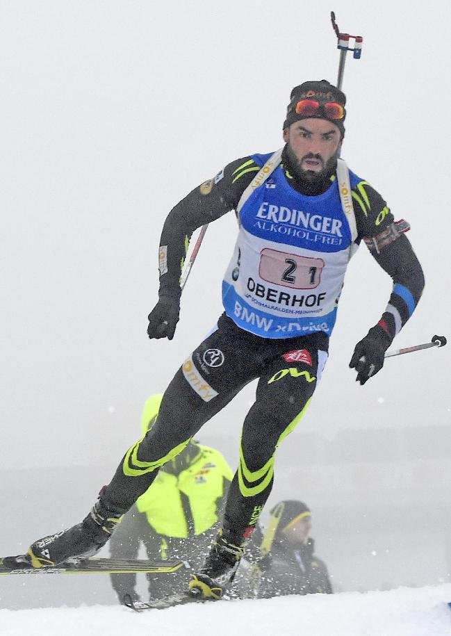 Simon Fourcade of France skis during the men's 4x7.5 kilometers фото (photo)