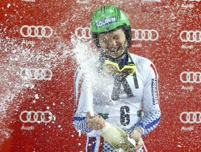 Khoroshilov of Russia celebrates after winning men's Alpine фото (photo)