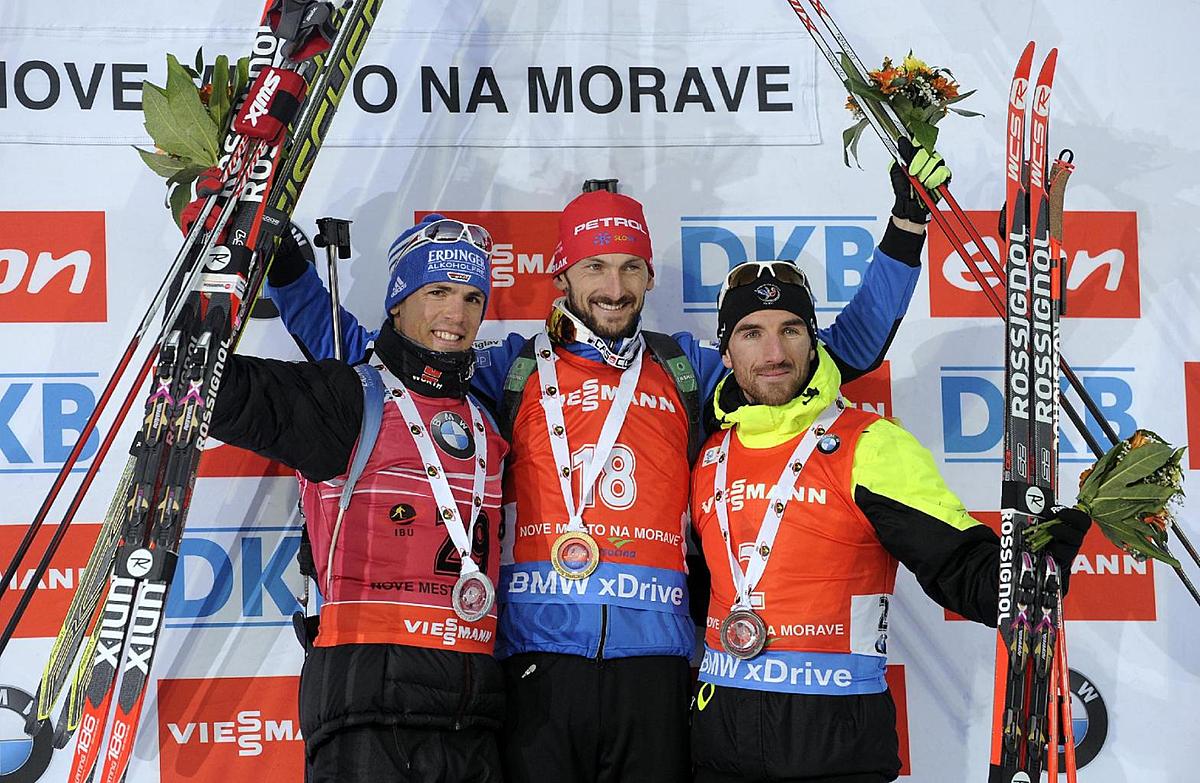 Second placed Simon Schempp from Germany, winner Jakov Fak from фото (photo)