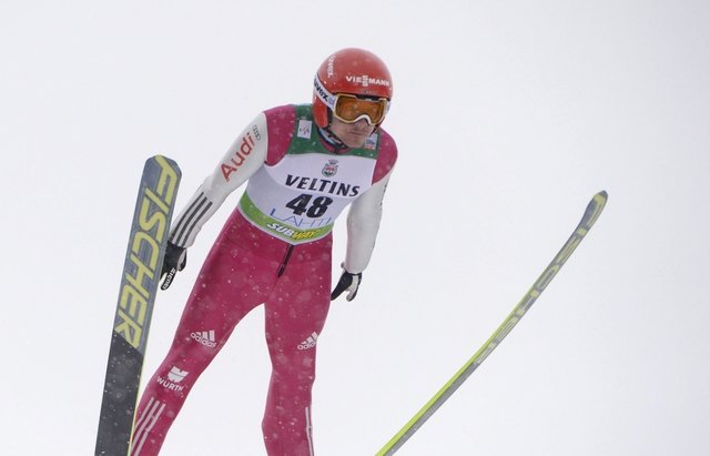 Germany's Fabian Rissle competes in the Nordic Combined фото (photo)