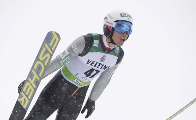 Japan's Akito Watanabe competes in the Nordic Combined фото (photo)