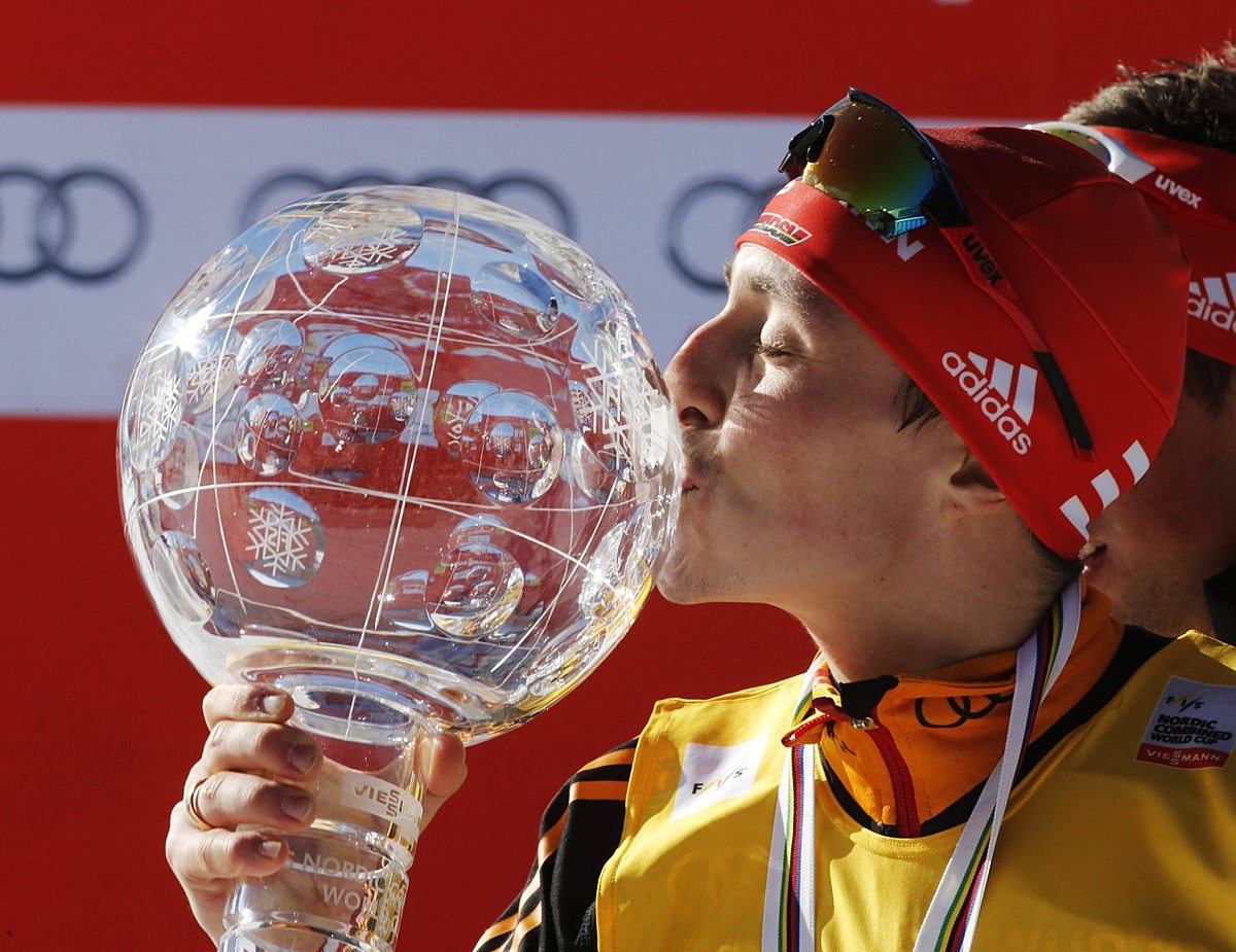 Frenzel of Germany kisses the crystal trophy for overall winner фото (photo)