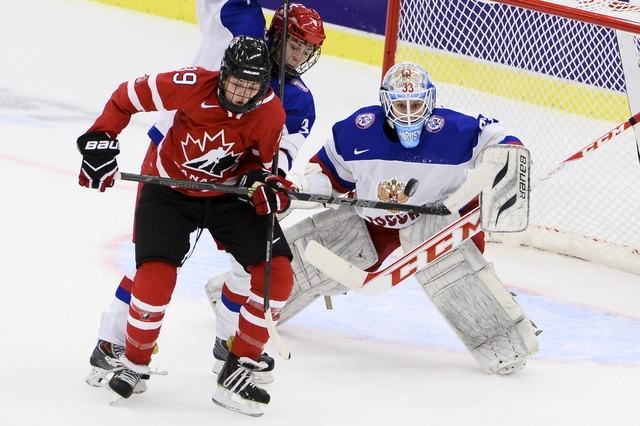 Хоккей в России: Canada's Emily Clark vies with Russia& фото (photo)