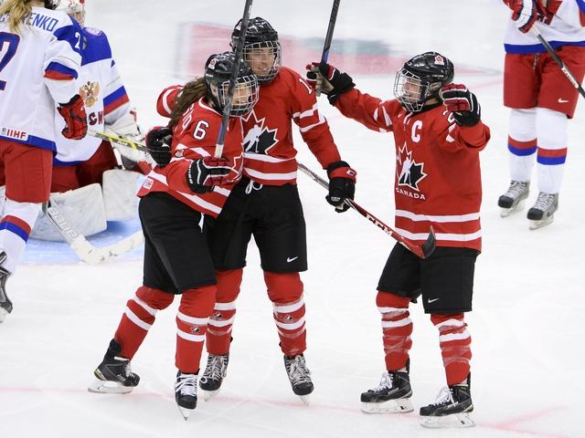 Хоккей в России: Canada's Caroline Ouellette celebrates with фото (photo)