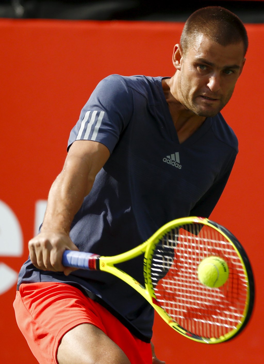 Youzhny of Russia returns the ball to Simon of France during фото (photo)