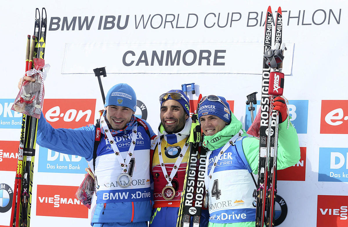 Silver medalist Anton Sipulin of Russia, left to right, gold фото (photo)