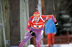 Биатлон Tim Burke of Paul Smiths, N.Y., skis in the third leg of the фото (photo)