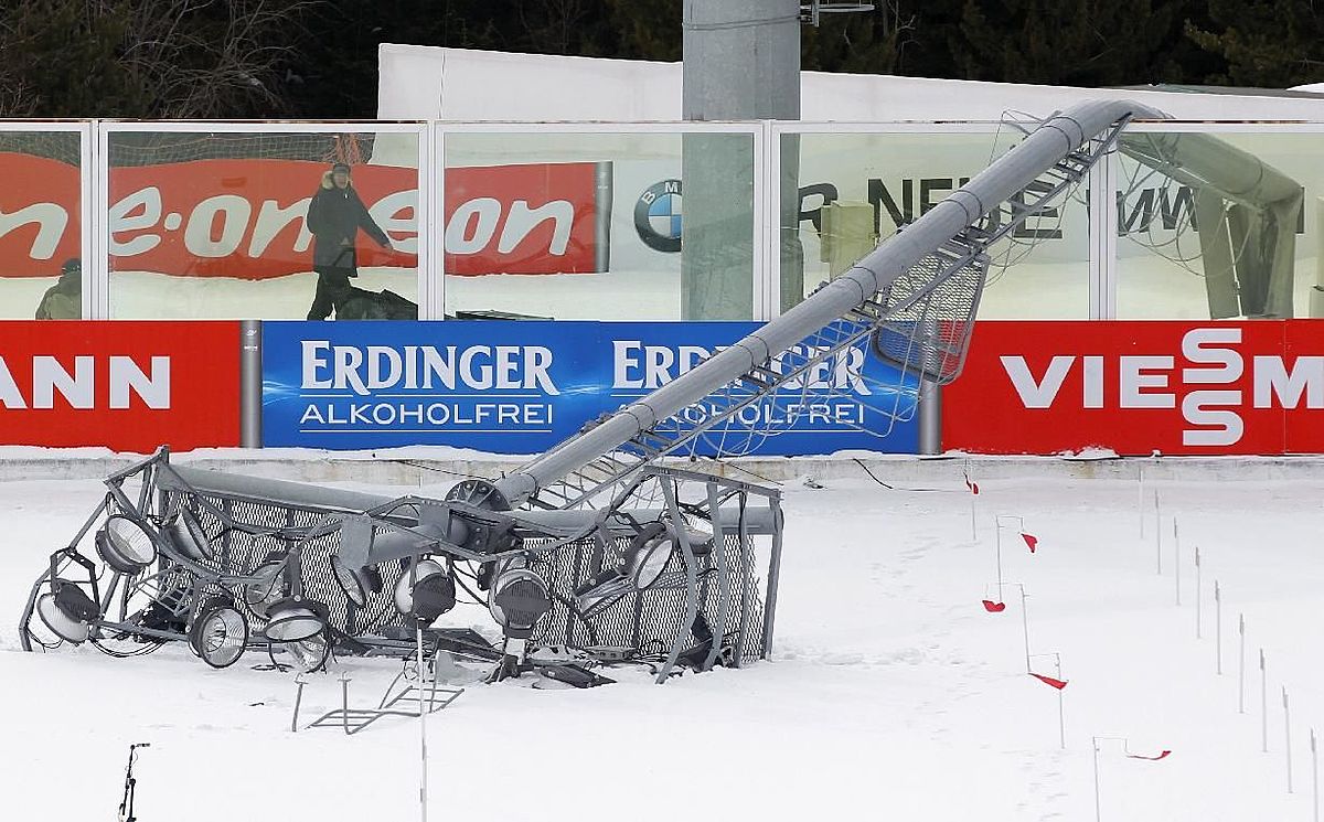 A lights post lays on the shooting range after strong winds, фото (photo)