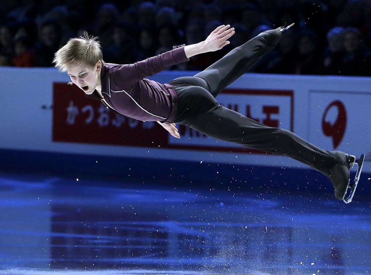 Mikhail Kolyada, of Russia, skates during the exhibition program фото (photo)