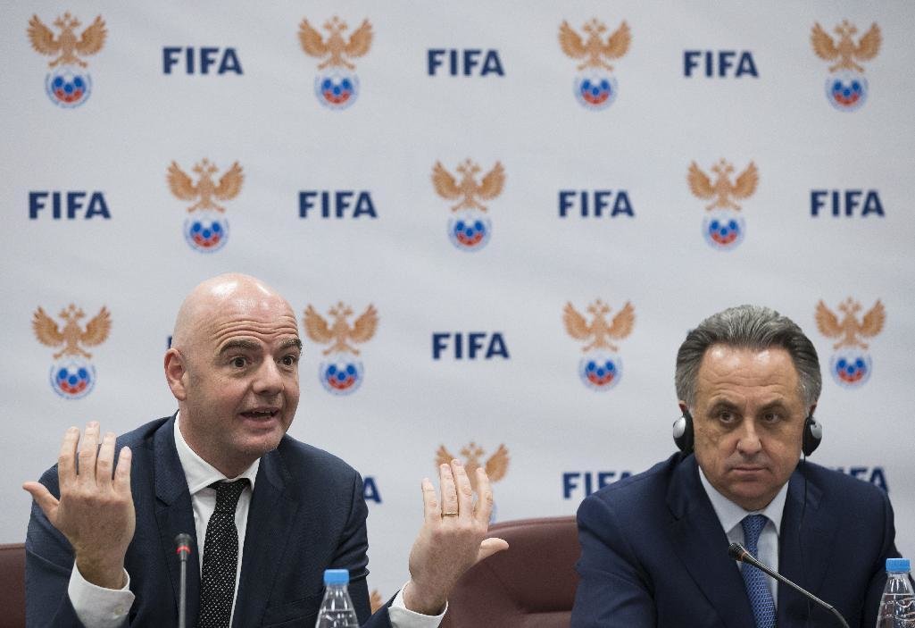 FIFA President Gianni Infantino, left, speaks as Russian Sports фото (photo)
