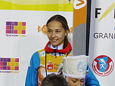 Лыжи Ирина Аввакумова на финальном этапе Гран-при по прыжкам на лыжах с трамплина в Чайковском (Пермский край)