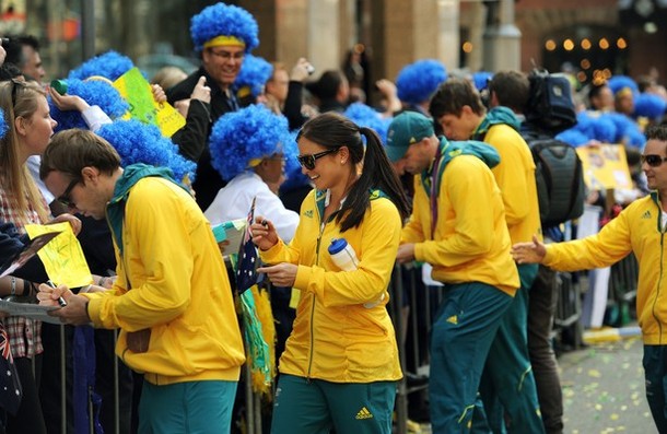 Australian Olympians sign autographs for spectators as the Australian фото