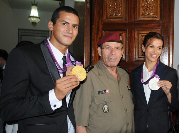 Tunisian Chief of staff, General Rachid Ammar (C), poses with фото