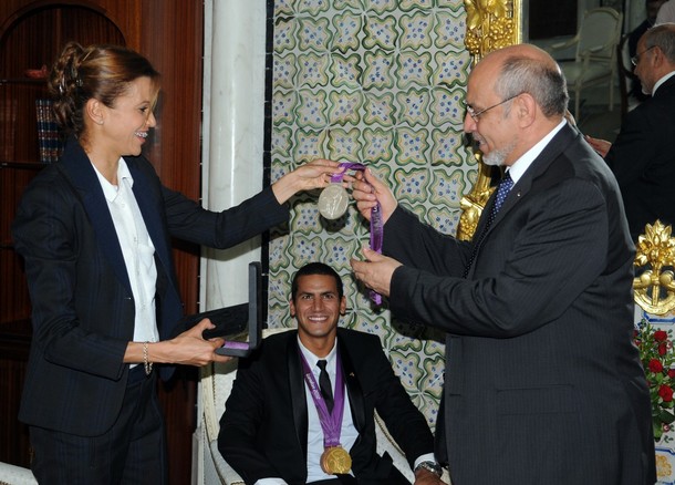 Tunisian Prime Minister Hamadi Jebali (R) meets Olympic silver фото