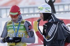 Germany's Simone Hauswald (R) chats with her team mate Kati Wilhelm during a training session at the Biathlon World Cup in the eastern German town of Oberhof, January 5, 2010. The World Cup runs until January 10.