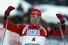 Emil Hegle Svendsen from Norway celebrates his victory in the men's 15 kilometres mass start race at the Biathlon World Cup in the southern Bavarian resort of Ruhpolding, January 16, 2010. Svendsen won the race ahead of Russia's Evgeny Ustyugov and Austria's Simon Eder.