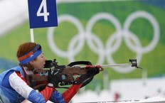 Russia's Anna Boulygina prepares to shoot during a training session for the women's biathlon event at the Vancouver 2010 Winter Olympics in Whistler, British Columbia, February 12, 2010.