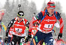 Russia's Ivan Tcherezov leads Italy's Markus Windisch as they compete in a men's Biathlon 4x7,5 kilometer relay race in Anterselva, Italy, Sunday, Jan...