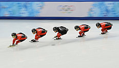 Конькобежный спорт Members of the men's Canadian short track speed skating team фото (photo)