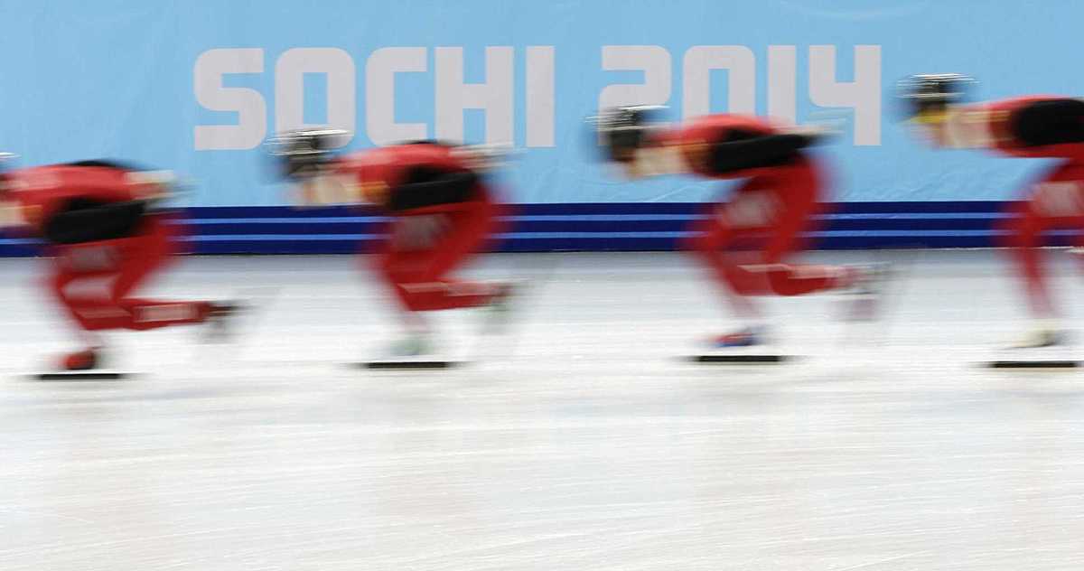 Chinese skaters train during a short track speedskating practice фото (photo)