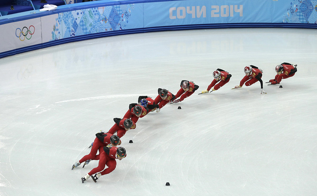 Chinese skaters train during a short track speedskating practice фото (photo)
