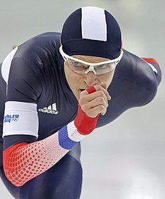 Конькобежный спорт Ewen Fernandez of France looks at his coach as he competes in фото (photo)