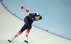 Конькобежный спорт Ewen Fernandez of France competes in the men's 5,000-meter фото (photo)