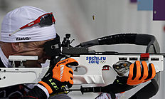 Биатлон Austria's Christoph Sumann shoots during the men's biathlon фото (photo)