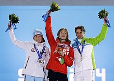 Women's biathlon 10K pursuit medalists, from left, Norway's Tora Berger, silver, Belarus' Darya Domracheva, gold, and Slovenia's Teja Gregorin, bronze,...