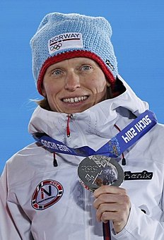 Silver medalist Norway's Tora Berger poses during the medal фото (photo)
