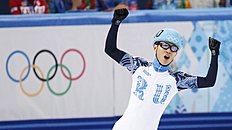Конькобежный спорт Russia's Victor An celebrates after the men's 5,000 metres фото (photo)