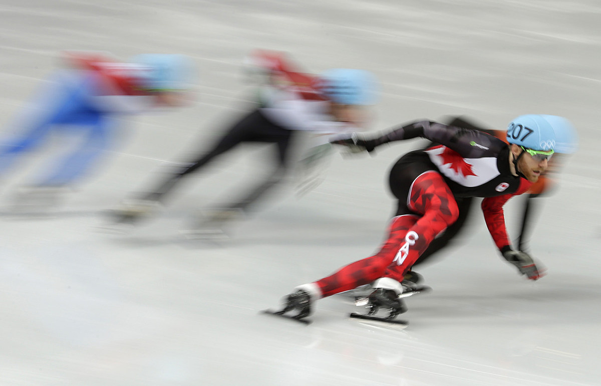 Olivier Jean of Canada competes in a men's 1000m short track фото (photo)