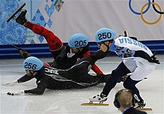 Конькобежный спорт Canada's Charles Hamelin and Eduardo Alvarez of the U.S. фото (photo)