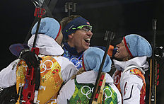 Norway's relay team Tora Berger, Tiril Eckhoff and Ole Einar фото (photo)
