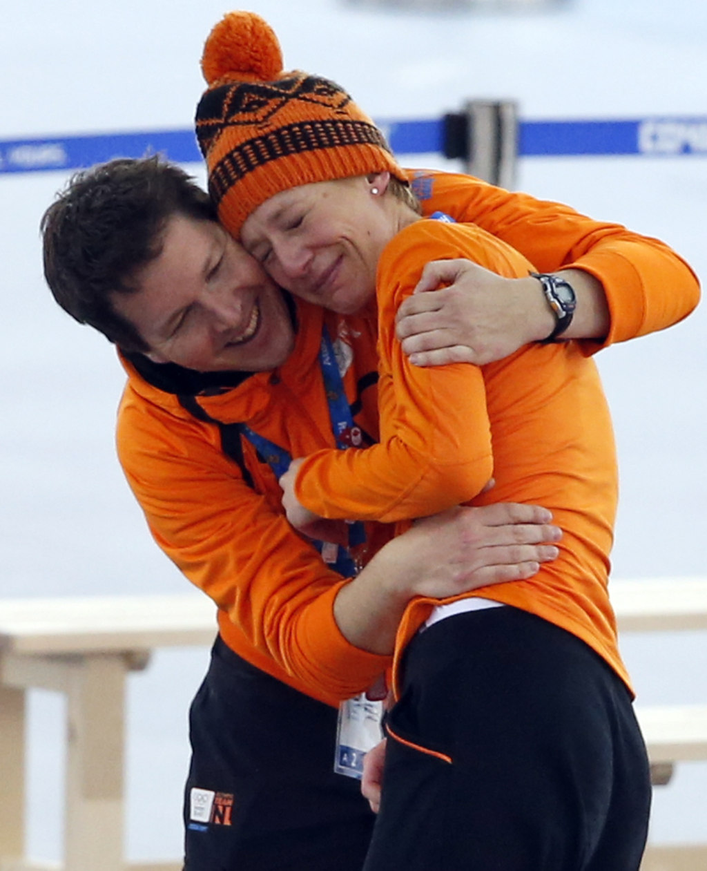A coach hugs an emotional Carien Kleibeuker of the Netherlands фото (photo)