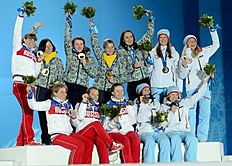 SOCHI, Feb. 22, 2014 (Xinhua) -- Gold medalists of team Ukraine (Top), silver medalists of team Russia (Bottom L) and bronze medalists of team Norway pose...