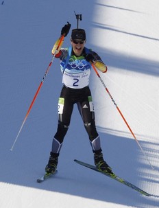 Germany's Magdalena Neuner competes in the women's 12.5 km mass start biathlon final at the Vancouver 2010 Winter Olympics in Whistler, British Columbia, February 21, 2010. Neuner won the gold medal ahead of Russia's Olga Zaitseva who won silver and Germany's Simone Hauswald who won bronze.