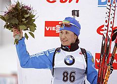 Russia's Daria Virolaynen celebrates her second place in the women's 7.5km sprint at the biathlon World Cup competition in Pokljuka, Slovenia, Thursday,...