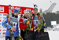 CORRECTING NAME OF RUSSIAN ATHLETE TO ALEXANDER LOGINOV — Simon Eder of Austria, centre, on the podium as he celebrates winning the Men's 12.5km WC-biathlon...