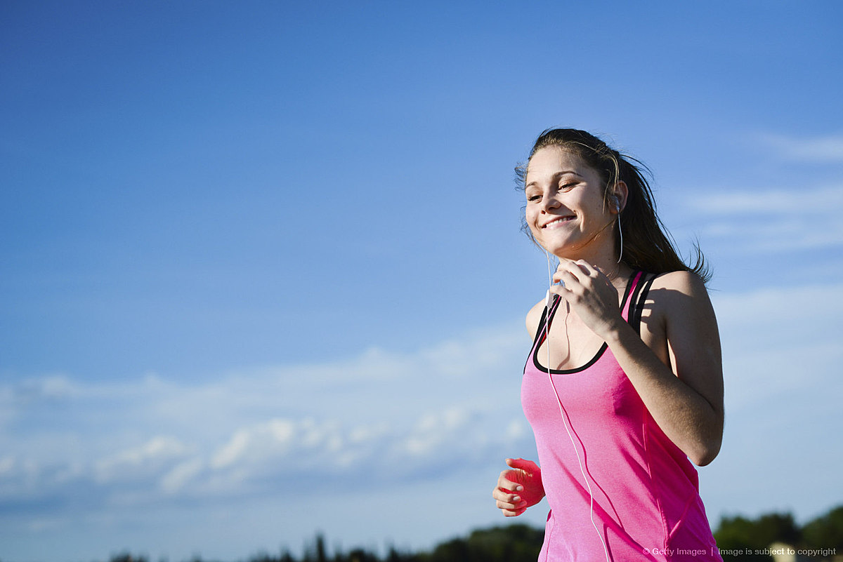 fitness sport healthy and cheerful young woman running outdoor