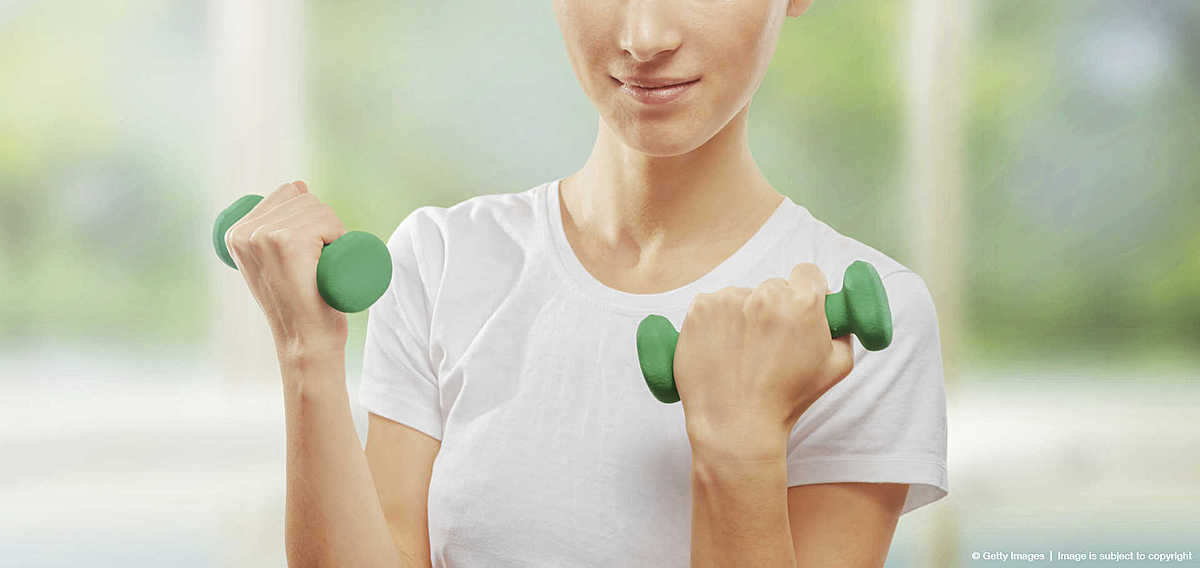 Fitness woman with dumbbells