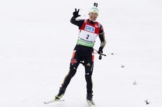 German Simone Hauswald celebrates after winning the women's biathlon World Cup mass-start on March 21, 2010, a 12.5km race with four shooting session, at the Holmenkollen Ski Arena in Oslo.