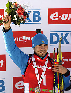 Биатлон Russia's Anton Shipulin celebrates his second place in the фото (photo)